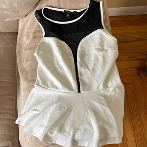 White with black mesh peplum top. Size medium. Worn once